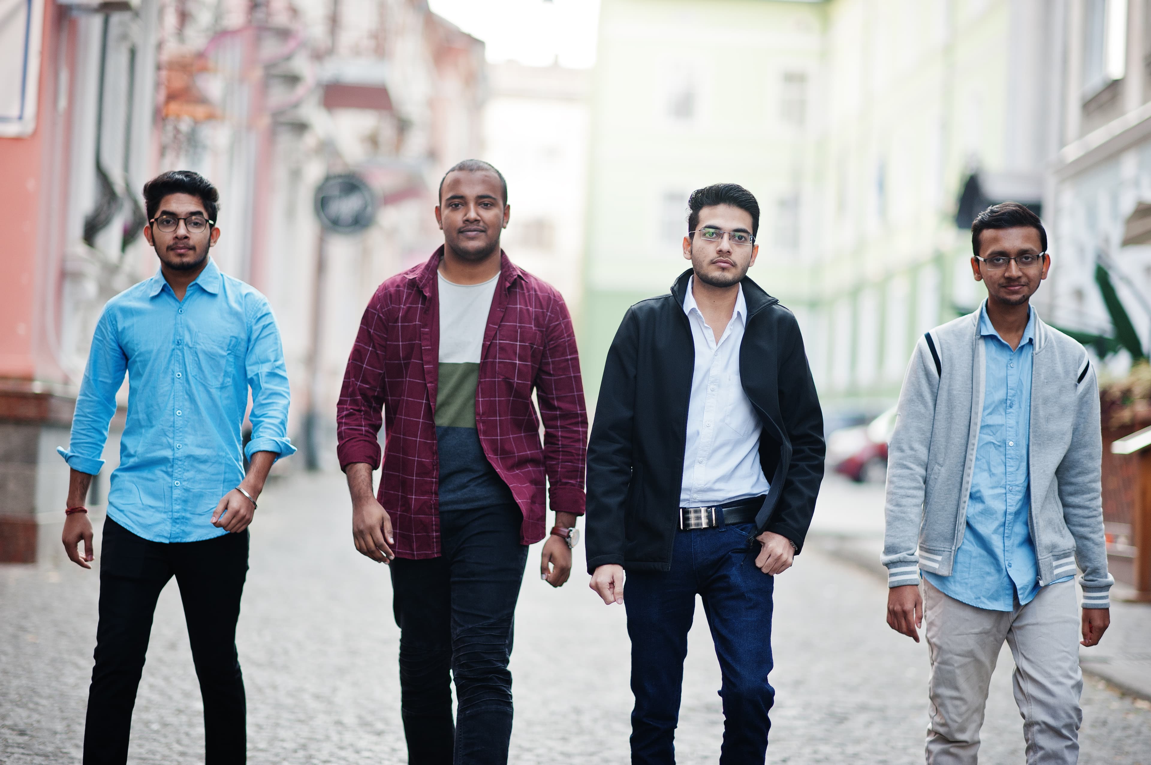 group-four-indian-teen-male-students-classmates-spend-time-together.jpg
